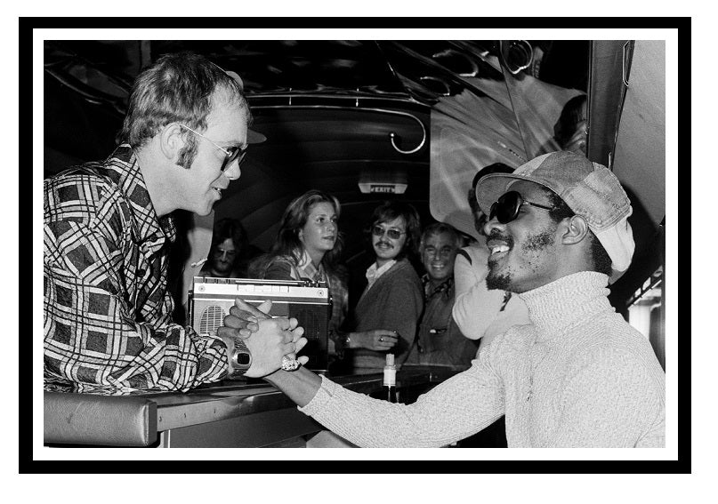 Elton John & Stevie Wonder on the Starship airplane in 1973 37 x 26