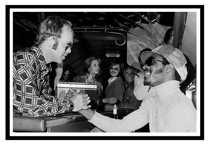 Elton John & Stevie Wonder on the Starship airplane in 1973 37 x 26