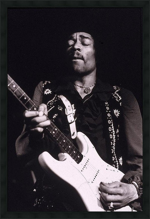 jimi-hendrix-performs-framed-print